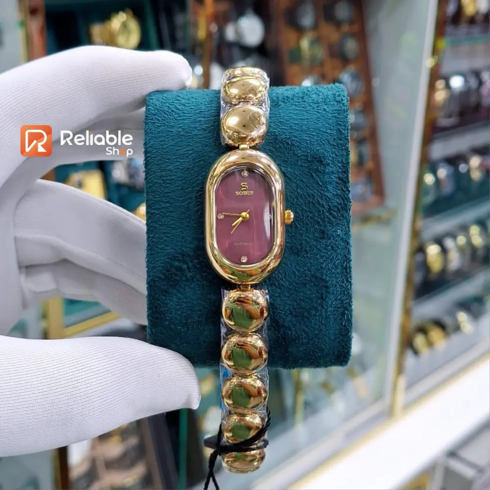 791355028_1935755261162760_8887251132414045227_n Sober-Luxury Ladies Women's Quartz Watch Oval Simple Design-Golden maroon - Image 1