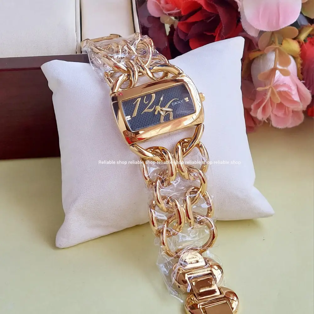 WhatsApp Image 2026-09-18 at 1.37.51 AM DKNY-Ladies party watch -Golden Black - Image 1